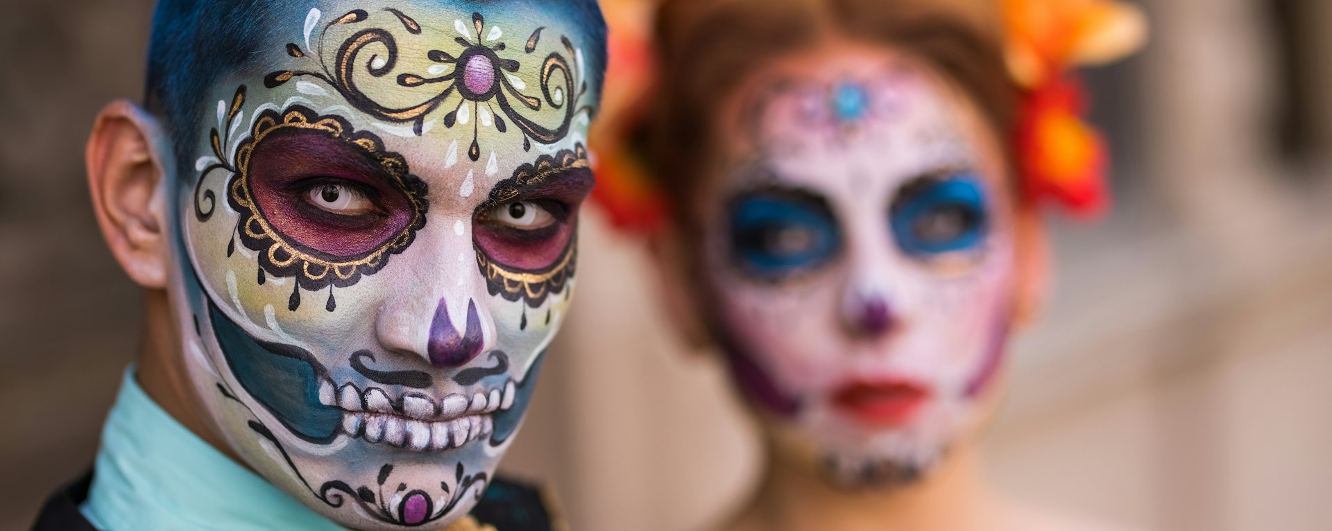 woman with blue and white face paint